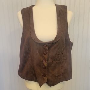 Maurices size xl button up vest with a scooped collar neck and sinched in back